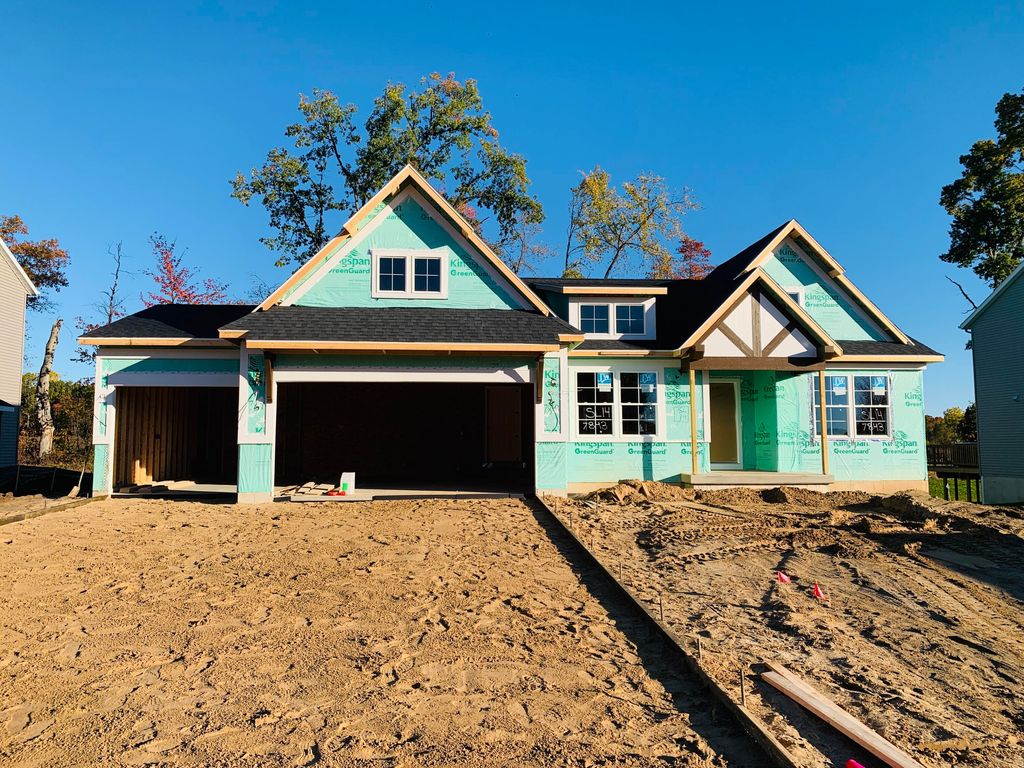 Photo of 7843 Woodhurst Drive NE, Rockford, MI 49341 (MLS # 25052986)