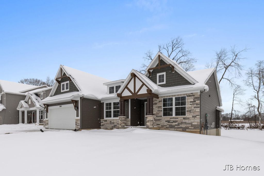 Photo of 7843 Woodhurst Drive NE, Rockford, MI 49341 (MLS # 25052986)