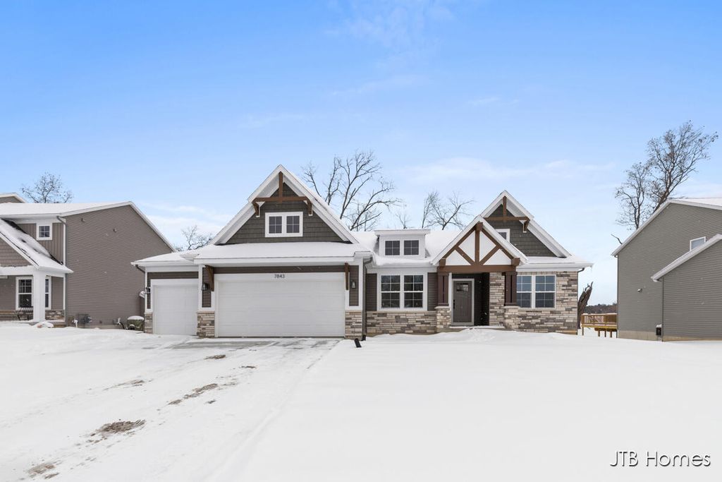 Photo of 7843 Woodhurst Drive NE, Rockford, MI 49341 (MLS # 25052986)