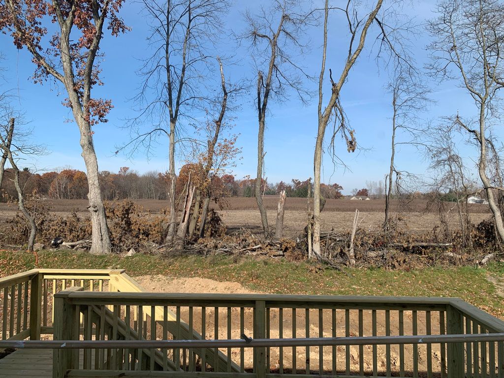 Photo of 7843 Woodhurst Drive NE, Rockford, MI 49341 (MLS # 25052986)