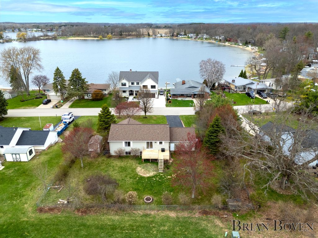 Photo of 7631 Hessler Drive NE, Rockford, MI 49341 (MLS # 26015591)