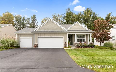 Photo of 12524 Retreat Drive #27, Grand Haven, MI 49417 (MLS # 25056058)