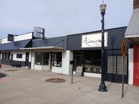 Photo of 126 & 128 S Main Street, Scottville, MI 49454 (MLS # 26030285)