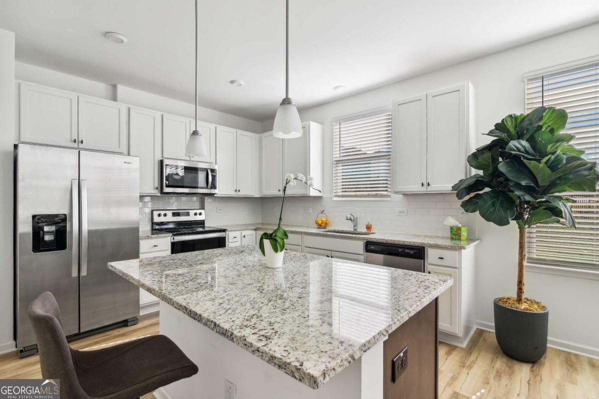 ***SIX WEEK RENT CONCESSION!*** This new-construction single-story townhome is just waiting for you to make a new start. Luxe finishes, an open floor plan, flowing natural light, and a spacious primary suite are the anchor features of this home, complemented by two secondary bedrooms perfect for family, guests, or additional living space like a home office or more. Don't miss your private attached two-car garage and semi-private spacious backyard. All landscaping is included and we've got you covered with a professional management and maintenance team at the ready, giving you peace of mind that you and your home are taken care of. This gated community is nestled in the back of a quiet master-planned community, so you can enjoy the community amenities including a pool playground, and more.