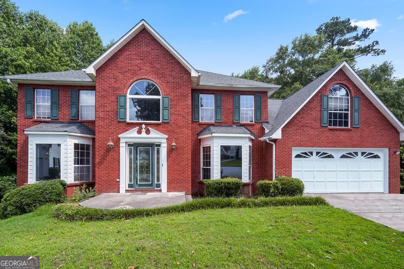 LOCATION! LOCATION! LOCATION! Welcome to this beautiful brick home with a full basement in an amazing neighborhood. This home has laminate floors throughout the main level, plenty of room for a growing family and lots of space to entertain inside and out. The property has a large kitchen area, separate living room, breakfast nook, dining room and family room. The entryway is sure to impress all guests and there is a bedroom on the main floor. The family room boast a fireplace with and overlooks the rear deck and sunroom. The fireplace is perfect for cozy nights. There is a large master with a separate tub and shower to relax. This beauty also has a large bonus room for guests, office, or theater room. The basement is large and ready to be customized to your liking. Plenty of supplies left to finish the work already started. Make this your future home today.
