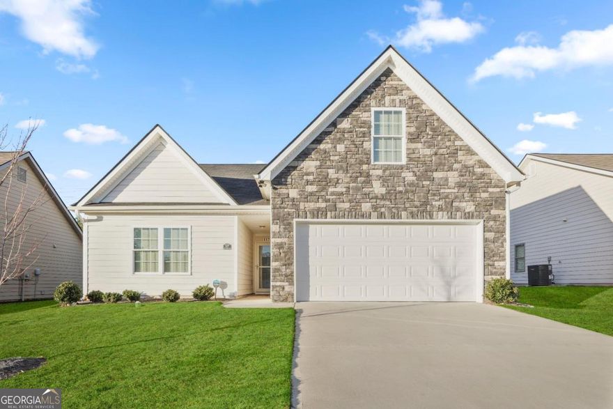 Welcome to stylish home built in 2020, offering a perfect blend of modern design and functional living. Located in one of Griffin's most desirable neighborhoods, this residence boasts three bedrooms and a versatile loft space, providing ample room for both relaxation and entertainment. As you step through the front door, you are greeted by an open-concept living area that seamlessly integrates the kitchen, dining, and living spaces featuring state-of-the-art appliances, sleek countertops, and ample cabinet space for all your culinary needs. The three bedrooms are thoughtfully designed, each offering a tranquil retreat with spacious closets and large windows that fill the rooms with natural light. The master suite is a haven of comfort, complete with an ensuite bathroom that features modern fixtures and finishes. One of the highlights of this home is the loft space, perfect for use as a home office, playroom, or additional living area. The flexibility of this space allows you to tailor it to your specific needs, providing an extra layer of functionality to the home. Don't miss the opportunity to make this stunning property your new home.