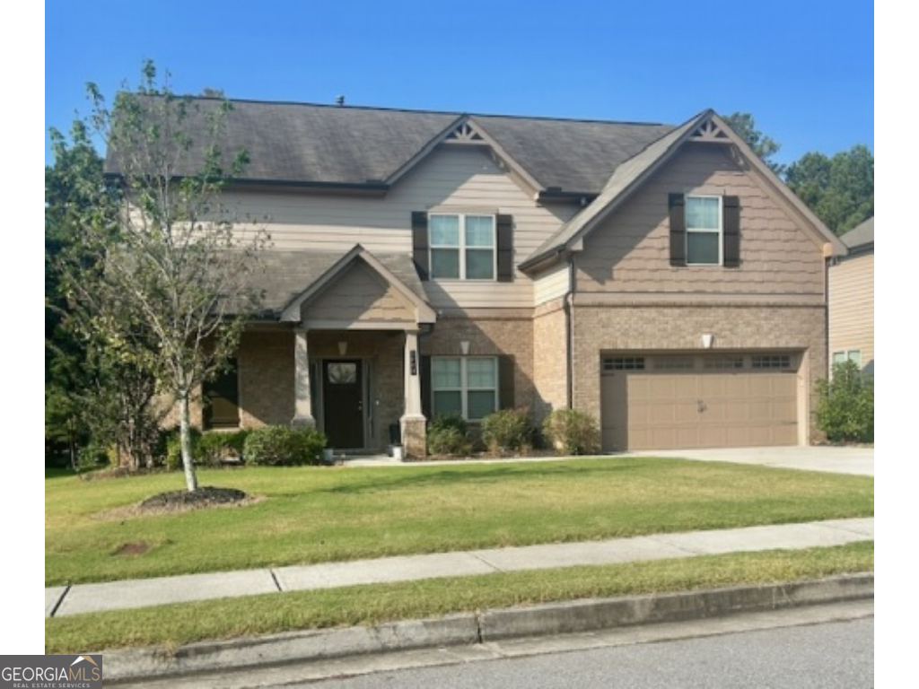 Beautiful 5-bedroom, 3-bath home in the sought-after Overlook at Brookside subdivision, this residence offers a quaint yet open-concept interior perfect for modern living. The main level features a separate dining room, elegant coffered ceilings, and a charming kitchen with granite countertops, a spacious island, and breakfast bar seating. A convenient bedroom and full bath on the main floor make an ideal in-law suite. Upstairs, you'll find four generously sized bedrooms, including a luxurious master retreat with a large en suite featuring a double vanity, separate tub and shower, and a walk-in closet. Ideally located close to downtown Auburn, this home combines comfort, style, and convenience in one perfect package.