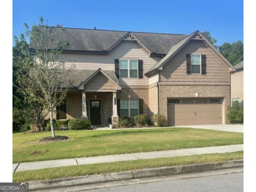 Beautiful 5-bedroom, 3-bath home in the sought-after Overlook at Brookside subdivision, this residence offers a quaint yet open-concept interior perfect for modern living. The main level features a separate dining room, elegant coffered ceilings, and a charming kitchen with granite countertops, a spacious island, and breakfast bar seating. A convenient bedroom and full bath on the main floor make an ideal in-law suite. Upstairs, you'll find four generously sized bedrooms, including a luxurious master retreat with a large en suite featuring a double vanity, separate tub and shower, and a walk-in closet. Ideally located close to downtown Auburn, this home combines comfort, style, and convenience in one perfect package.