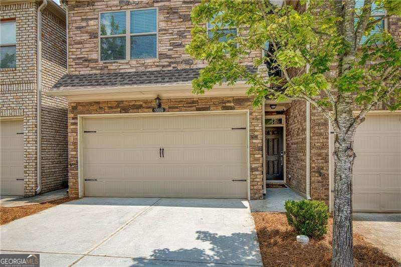 Photo of 10659 Naramore Lane, Johns Creek, GA 30022 (MLS # 10798226)