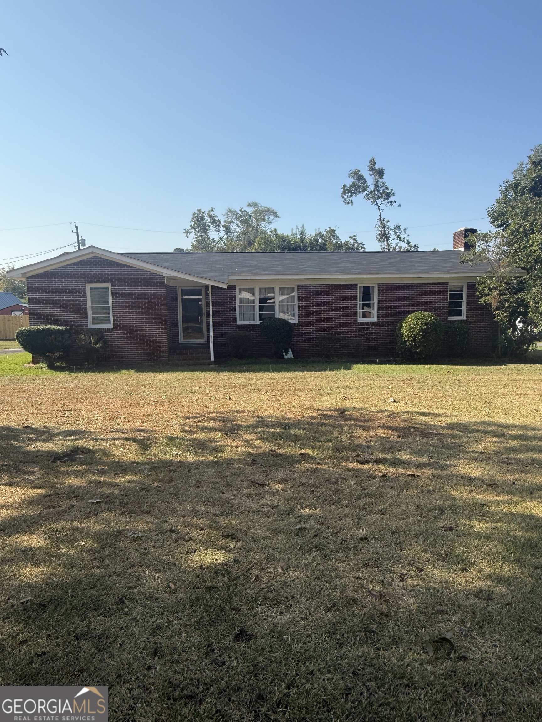 Nice brick home with 3 BR 2.5 Baths LR Dr Kit large family room with masonry FP. Has 2 car CP plus storage shed and stand alone Cp.