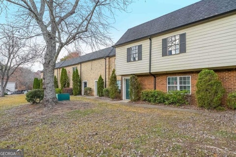 Photo of 400 Winding River Drive #E, Atlanta, GA 30350 (MLS # 10852026)
