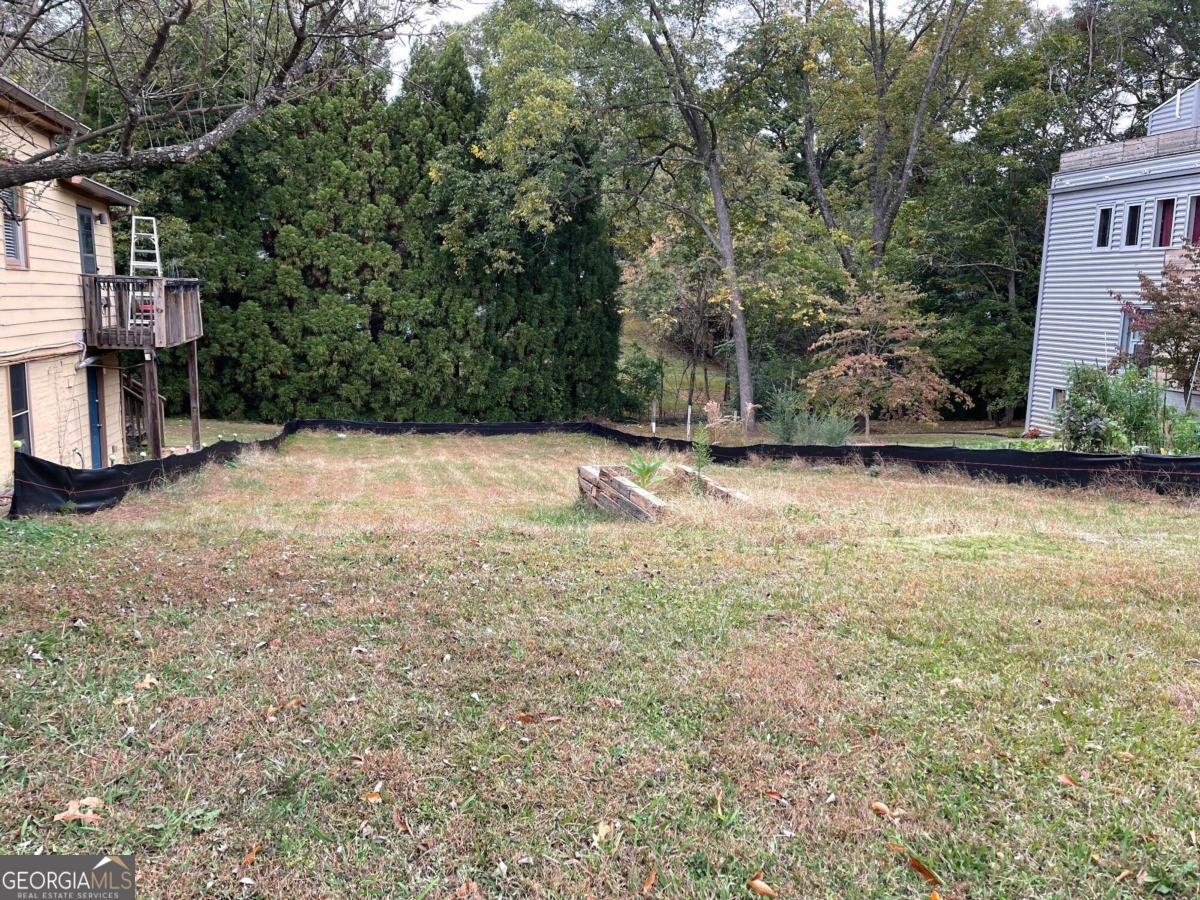 Building Lot in Hills Park neighborhood. Erosion control is installed, and approved stream buffer variance has been obtained, along with an approved front yard setback variance, which together allow for a much larger building footprint. Gently sloping basement lot. Hills Park is the ultimate location that straddles West Midtown and the Upper West Side. Convenient to The Works, Westside Park, and Westside Village. Trail connection under construction to connect with the Silver Comet Trail, and the Atlanta Beltline. This location supports a finished home price point in the $850 - $1 million range.
