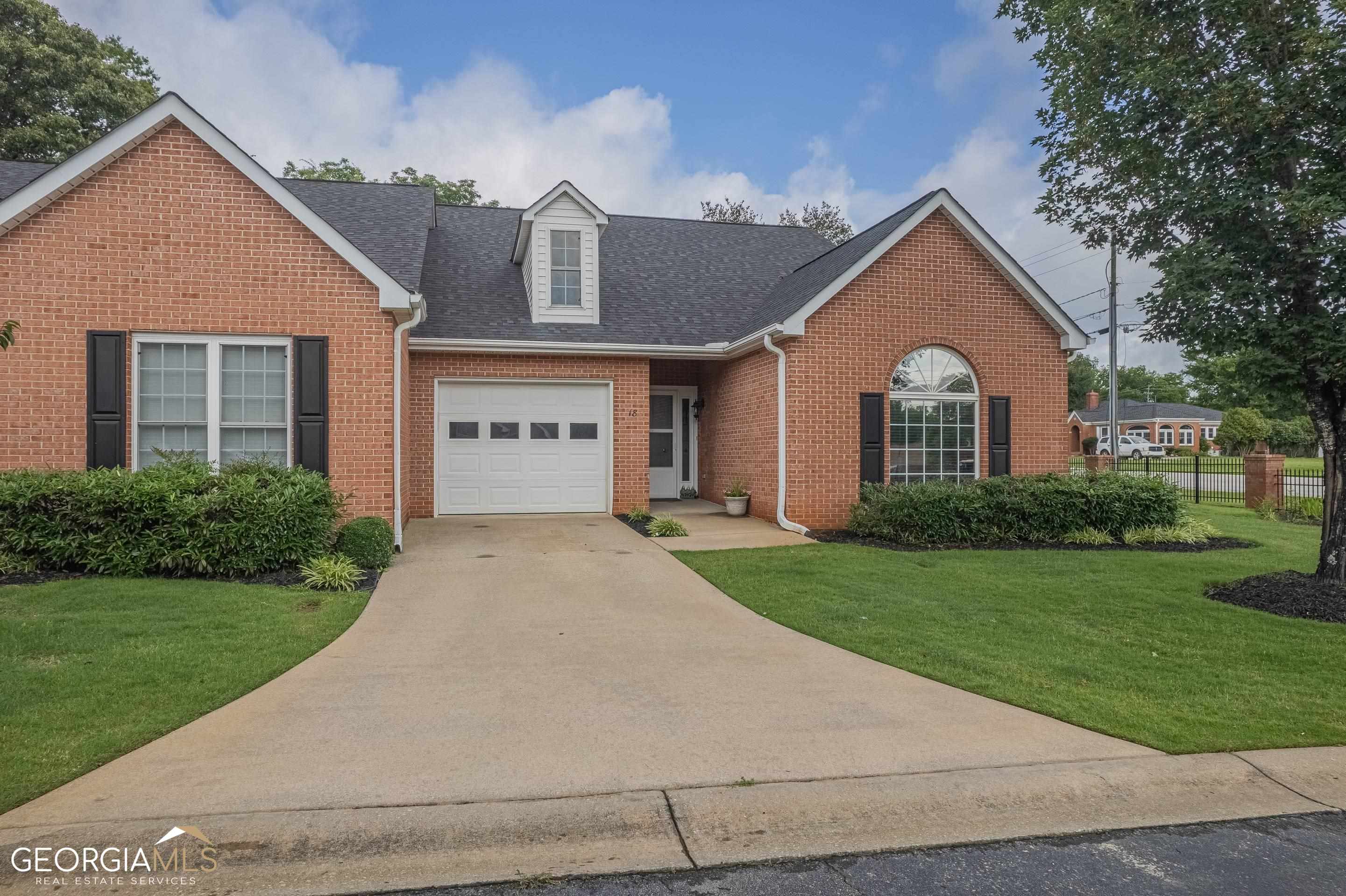 Welcome to this updated 2 bedroom, 2 bath townhome nestled in a vibrant 55+ community in downtown Hartwell, Georgia. Step inside and discover a modern interior that has been meticulously maintained and upgraded to meet the needs of today's discerning residents. The townhome showcases beautiful LVP flooring throughout, adding a touch of sophistication and making maintenance a breeze. The two bedrooms provide ample space for relaxation and privacy, with the master on the main level. The updated kitchen features sleek fixtures and finishes, creating a luxurious atmosphere. With no carpet, this home is ideal for those seeking a clean and hypoallergenic living environment. With over 300 feet of unfinished space on upper level, this home has tremendous potential! Located in the heart of downtown Hartwell, this community offers a vibrant and active lifestyle, with easy access to local amenities, shops, restaurants, and Lake Hartwell. HOA includes ALL exterior maintenance of lawn and building so there is never any work to do or repairs to be made! Don't miss the opportunity to be part of this thriving 55+ community. Schedule a showing today and experience the best of downtown living in Hartwell, Georgia.