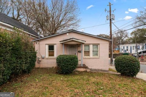 Photo of 722 Cameron M Alexander Boulevard NW, Atlanta, GA 30318 (MLS # 10654179)