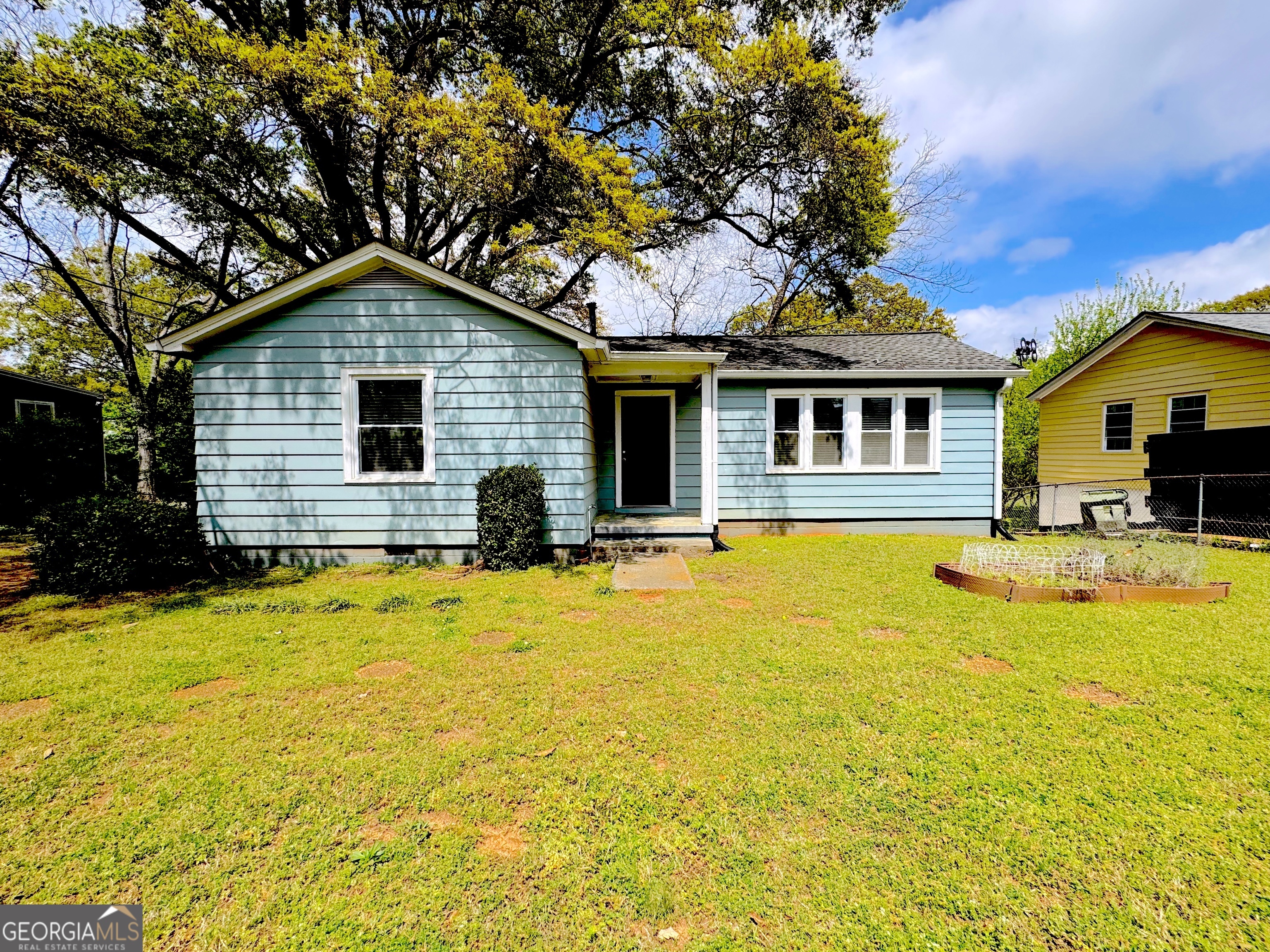 This property presents a multitude of possibilities as it is zoned for both commercial and residential use, catering to a wide range of businesses or serving as a private residence. The property underwent extensive renovation in 2016/2017 and boasts two bedrooms, one bathroom, an open concept kitchen and living room, and a fenced-in yard with a tranquil stream running along the back of the property line. Conveniently located near Marietta Square, the property also features a newer air conditioning system. This is an exceptional opportunity that should not be overlooked!