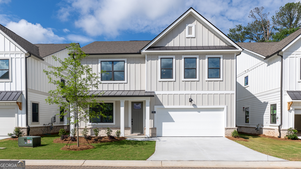 This stunning Harbor floorplan in East CobbCOs newest gated community, Village at Sandy Plains, showcases a perfect blend of modern style and functionality. The open-concept plan offers 5 bedrooms and 4 baths in a layout ideal for entertaining. A spacious gourmet kitchen featuring sleek quartz countertops, a vented wood hood, stainless steel appliances, and a large island that flows seamlessly into the dining and living areas. The main living space on the first floor boasts 9-foot ceilings, finished with durable RevWood flooring that flows to wood stairs with an open railing. Upstairs, youCOll find a versatile loft thatCOs perfect for additional living or working needs. The oversized primary bedroom provides ample space for a sitting area retreat, while the secondary bedrooms are thoughtfully placed on the opposite side of the home for privacy, with a convenient Jack-and-Jill bath. Elevated finishes throughout the home, craftsman details on the exteriors and a gated swim community make this home a must see. Located in a prime Marietta location, this property offers easy access to the Marietta Square, top-rated schools, shopping, dining, and major highways. ItCOs a truly extraordinary place to call home.