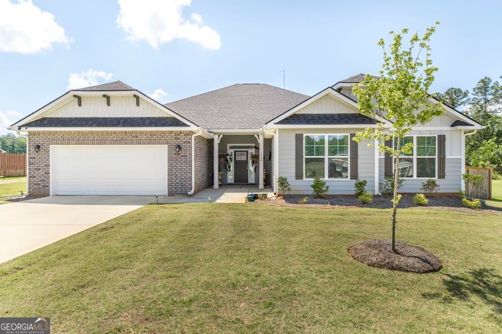 Photo of 1310 Barrington Place Cove, Macon, GA 31220 (MLS # 10770576)