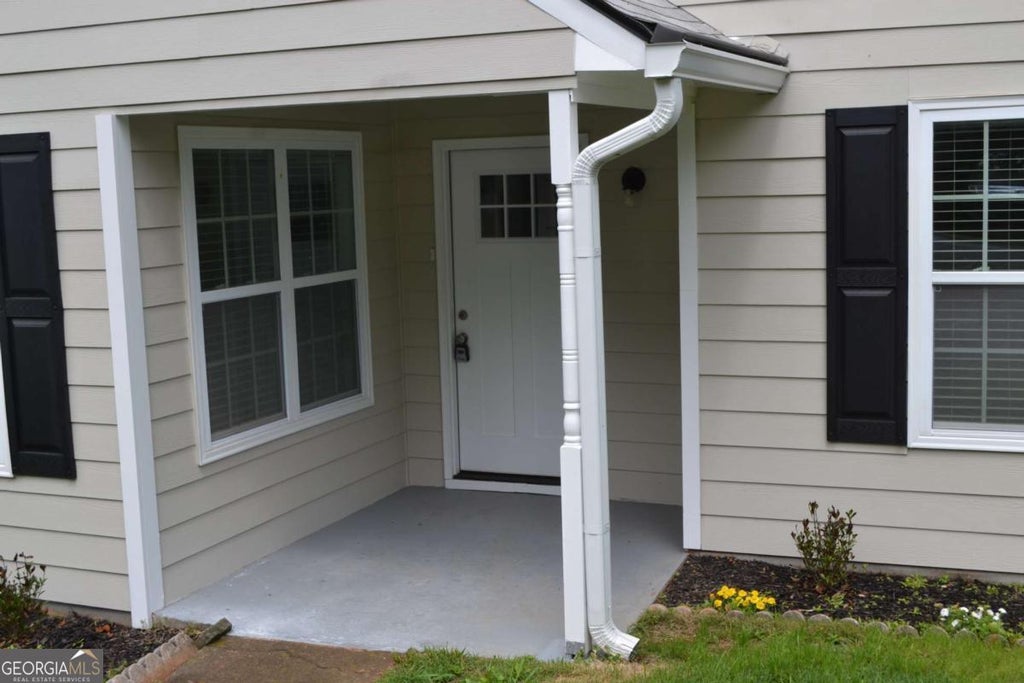 Photo of 5134 Hill Farm Drive NE, Woodstock, GA 30188 (MLS # 10841712)
