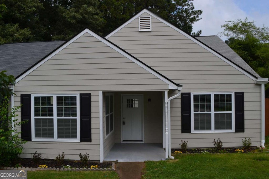 Photo of 5134 Hill Farm Drive NE, Woodstock, GA 30188 (MLS # 10841712)
