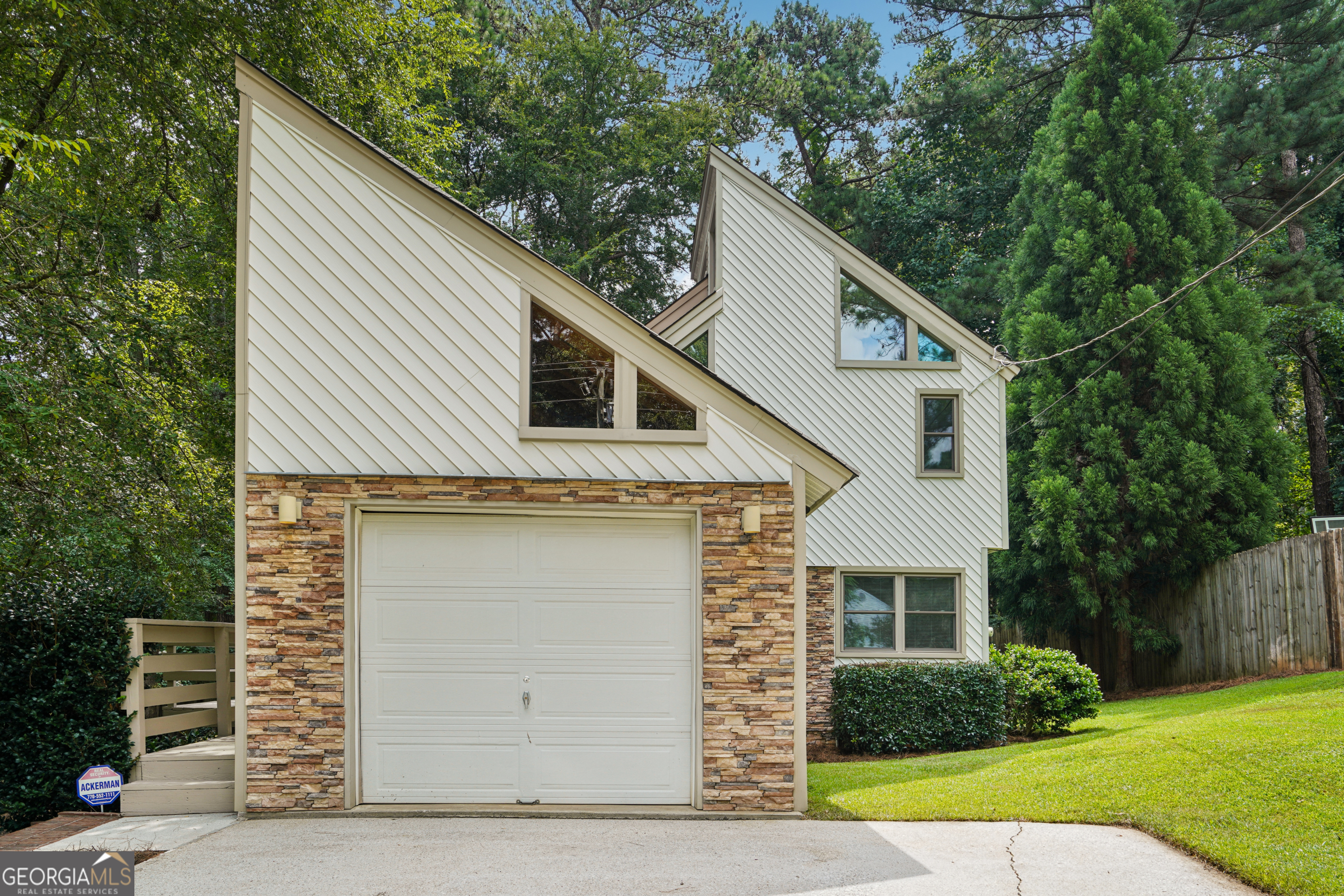 This beautifully updated home offers peace of mind with major system upgrades and transferable warranties, including new UV-protected windows installed in 2022 with a 50-year transferable warranty, a tankless gas water heater (Dec 2022) with a 15-year heat exchanger warranty and 5-year parts/labor coverage, and a high-efficiency HVAC system (Nov 2021) featuring 10-year parts/labor and multiple lifetime warranties, transferable with a continued maintenance contract. Additional improvements include new bamboo hardwood floors and stair treads (2024-2025), new interior doors and casing, new carpet with lifetime padding warranty (installed March 2025), and air ducts professionally cleaned in 2022. The kitchen boasts GE stainless steel appliances (2025), an LG French door refrigerator, and a modern stainless steel sink. Exterior perks include a matching stone mailbox with lock, and access to Norris Lake's private amenities-lake, beach, playground, pool, tennis courts, and clubhouse-offering both comfort and community.