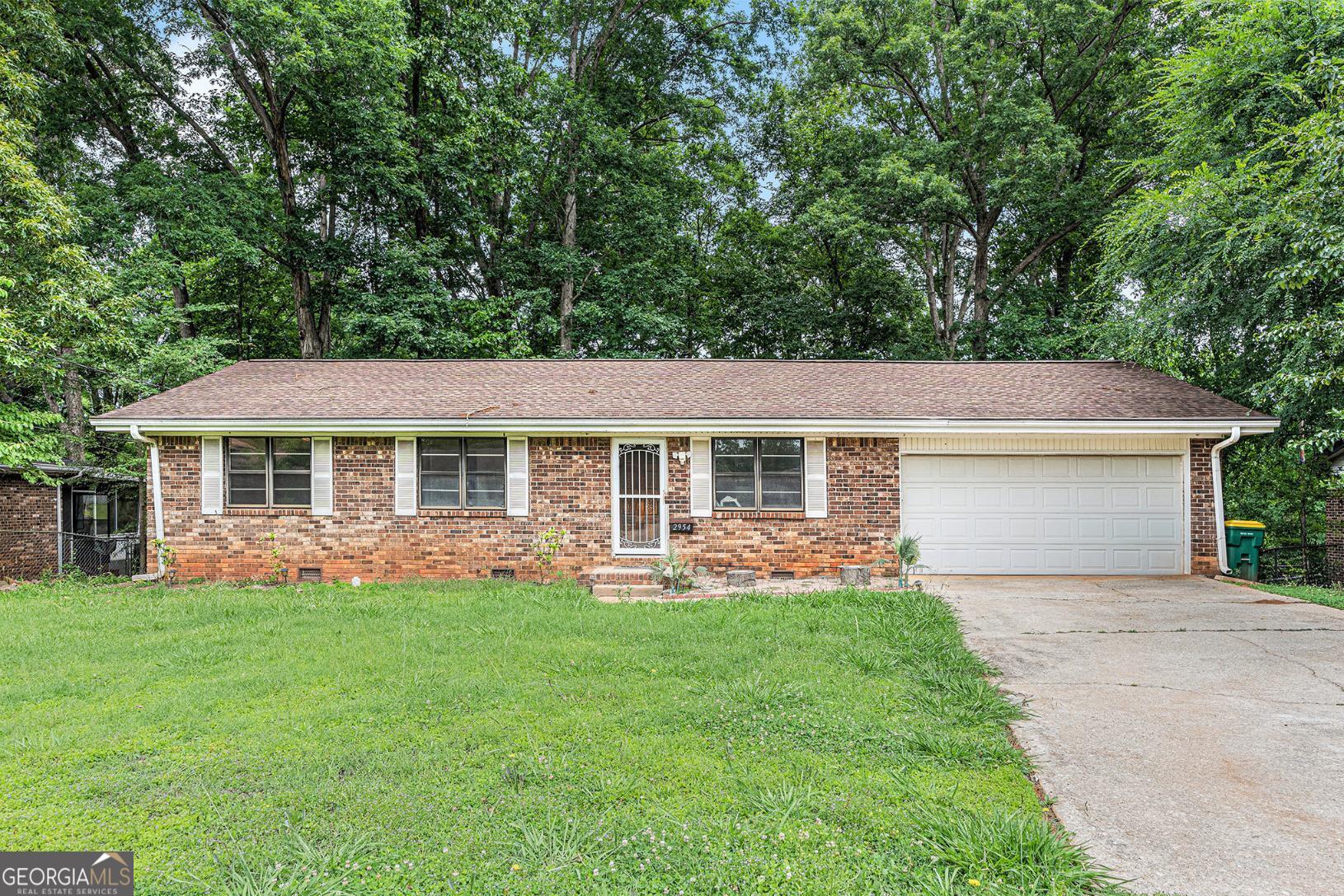 Welcome to this beautifully maintained 3-bedroom, 2-bathroom brick ranch nestled in a quiet, established neighborhood in Rex, GA. Boasting a spacious open floor plan, this home offers the perfect blend of comfort and style. Step inside to find low-maintenance luxury vinyl plank (LVP) flooring throughout the main living areas, adding both durability and modern appeal. The bright and airy living room flows seamlessly into the dining area and kitchen-perfect for entertaining or everyday living. The kitchen features ample cabinet space and a layout designed for efficiency. All three comfortably sized, including a primary suite with a private bath. Outside, enjoy your own private retreat with a fully fenced backyard and a generous deck-ideal for grilling, relaxing, or hosting friends and family. With its single-level living, solid brick exterior, and great curb appeal, this home is a must-see. Conveniently located near schools, shopping, and major highways, this move-in-ready gem won't last long. Schedule your showing today!