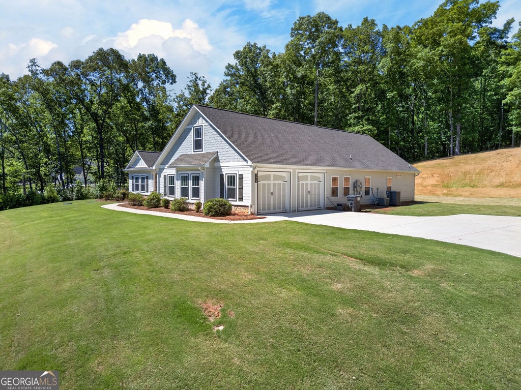 Photo of 173 W Lake Boulevard, Carrollton, GA 30116 (MLS # 10806346)