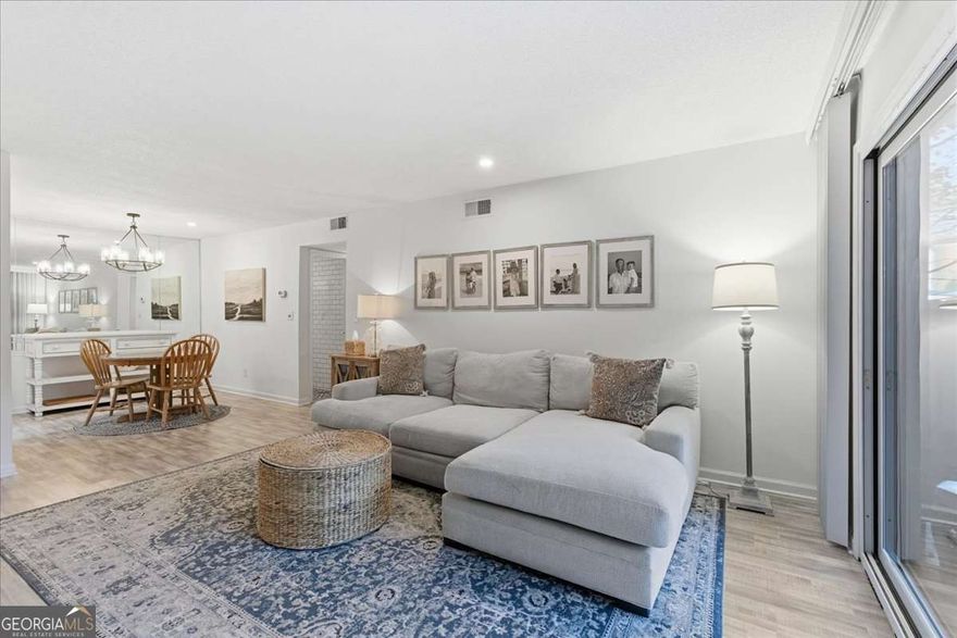 This move-in ready 2-bedroom, 1-bath condo in Foxcroft Condominiums, one of Sandy Springs' most convenient and sought-after gated communities, offers an unbeatable combination of modern upgrades, step-less single-level living, and an outdoor space unlike anything else on the market.    This is the only home with this layout to hit the market in several years, and it's priced aggressively to sell fast. To make this opportunity even sweeter, the Sellers will pre-pay six months of HOA dues for the Buyer.     Inside, you'll find a bright and spacious living and dining area with luxury vinyl plank flooring throughout, perfect for everyday comfort and easy maintenance. The updated kitchen features recently installed white cabinets, quartz countertops, and sleek modern finishes, while the renovated bathroom includes white subway tile, quartz counters, and modern tile flooring for a clean, timeless look.    The primary bedroom suite is generously sized and includes a large walk-in closet, while the second bedroom offers versatility for guests, a home office, or a creative space.    Step outside to your private, fully fenced ~150 sq. ft. patio and garden area, a true rarity in condo living! It's ideal for entertaining, relaxing, working outdoors, or enjoying a pet-friendly retreat with room to garden or unwind in privacy.    Just beyond your patio gate, you're steps from three recently resurfaced, secured tennis courts, a beautiful community pool, and open green spaces for a peaceful, park-like feel.    The HOA covers all utilities including water, sewer, power, natural gas, termite, pest control, and high-speed internet, making this one of the most affordable, maintenance-free lifestyles in Sandy Springs.    Located just north of Abernathy on Roswell Road, Foxcroft offers quick access to I-285 and GA-400, with The Weber School, Mercedes-Benz HQ, UPS HQ, Perimeter Mall, and City Springs all just minutes away.    Investor friendly! The community maintains a rental cap, but rental permits are available at the time of listing.    Don't miss your chance to own this rare patio-level condo with unmatched privacy, upgrades, and convenience. Schedule your private showing today and see why this one stands out above the rest!