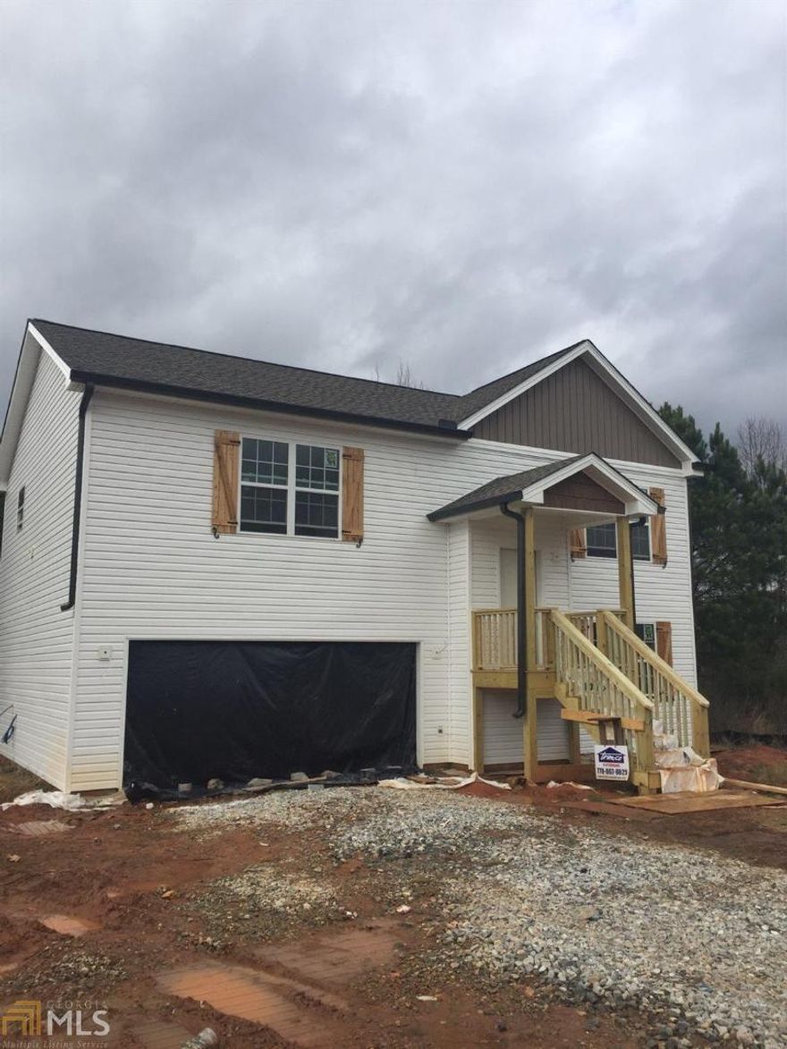 New construction Split Foyer Home features 5 bedrooms, 3 full baths, open living/dining room area, kitchen with white cabinets/granite countertops and SS/Black Appliances.  3 bedrooms upstairs with 2 full baths, 2 bedrooms downstairs with 1 full bath.  Large Cul de sac lot.  Listing Agent is related to Seller.  Will be move in ready first week in May.
