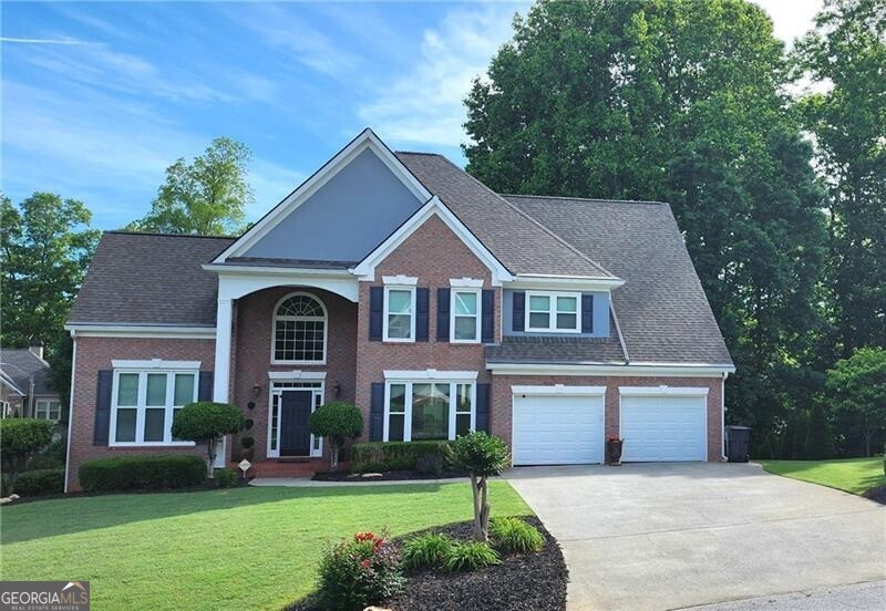 GORGEOUS HOME in sought after Brookstone with an awesome SWIM SPA, plus a SEPARATE APARTMENT with its own Separate Driveway on Terrace Level, perfect for any aged family member! Newly renovated apartment includes wider doorways, family room, full kitchen, bathroom, one bedroom, bonus room, an office area, lots of storage, separate exterior entrance with no steps, long driveway with plenty of room for parking. Situated on a beautiful well landscaped and manicured corner/cul de sac lot, the sellers have spared no expense in maintaining their home! In the last three years upgrades include: Exterior painted, vinyl fascia boards installed, new windows throughout with lifetime transferrable warranty, new roof, new blinds, new composite oversized deck with built in 8 X 15 Heated Swim Spa with lights, jets and hot tub seats, new hot water heater and furnace, new compressor, new double ovens, vents cleaned, new garage doors and openers! Custom kitchen with plenty of drawer space and counterspace, huge center island, two pantries, spacious eating area. Butler pantry with additional cabinets and counterspace, large dining room with plenty of room for seating, two family rooms, front and rear staircases, laundry room with sink, plus a mudroom with cabinets for even more storage. Four spacious bedrooms and three full bathrooms on the second level, including the large primary suite and renovated ensuite with his and her vanities, whirlpool tub, tiled shower, walk in closet. Close to shopping, restaurants, post office, YMCA, library and top rated schools! The HOA offers many activities including free concerts on the green, activities for the holidays including amazing fireworks for 4th of July, and so much more, plus there is a playground, all sports court, and you can join the swim/tennis. You also have the option to join Brookstone Golf and Country Club which has an 18 hole golf course, restaurant, fitness center, pools, tennis courts, bocce ball and pickleball.