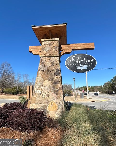 Photo of 6770 Winding Canyon Road, Flowery Branch, GA 30542 (MLS # 10673368)