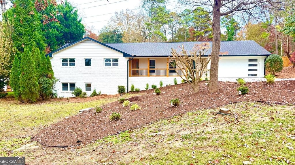 Photo of 7235 NE Thornhill Ln, Atlanta, GA 30328 (MLS # 10650233)