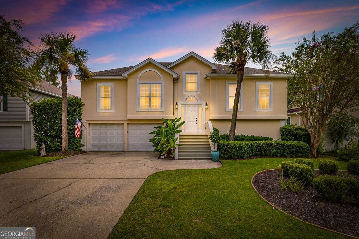 Your private island oasis awaits on the mid-south end of SSI. Enjoy year round, resort style living with a dual-heated, fully screened saltwater pool, swim bug free in every season! This beautifully renovated home blends coastal charm with modern convenience, all at a price that's hard to beat. The upper level welcomes you with an airy open floor plan, anchored by a spacious primary suite featuring a spa-like bath and an expansive oversized closet. The kitchen combines style and function with modern appliances, ample cabinetry, and generous counter space for both cooking and entertaining. The lower level offers a fully conditioned retreat of its own, including a large recreation room or gym, a private office, and a versatile flex space with a convenient half bath. Square footage of lower level is included in overall square footage. The *estimated square footage on the upper level is 1579 and the *estimated square footage of the lower level is 521. Enjoy the outdoors in your screened two-story deck and in-ground saltwater pool. With both solar and electric heating, you'll swim in comfort all year, surrounded by peaceful coastal greenery. After a dip, step into your private enclosed outdoor shower for the perfect finish. This home is priced to sell quickly, don't miss the rare opportunity to own such a unique island retreat. Schedule a showing today!