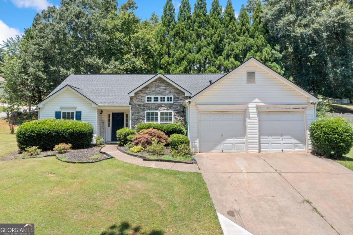 Charming 3 Bedroom Ranch in Sought-After Forsyth County - location, location, location!! FREE Home Warranty with Preferred Lender ALSO....Seller will pay Buyer closing cost will Full Price Offer!! NEW Garage Doors in garage and ready for installation! NEW roof and NEW Septic system including field lines!! NEW flooring and more! Welcome to your new home in beautiful Ball Ground, GA! This amazing 3 bedroom, 2 bath ranch offers the perfect blend of comfort, convenience, and community. Nestled in a quiet, family-friendly neighborhood with an affordable HOA, this home sits in one of Forsyth County's top-rated school districts-ideal for growing families. Step inside and be welcomed by a bright, open-concept floor plan designed for both comfort and style. Sunlight pours through large windows, showcasing the brand NEW luxury vinyl plank flooring that flows seamlessly throughout the home. The beautifully updated kitchen features sleek stainless steel appliances, granite countertops, crisp white cabinetry, and a convenient breakfast bar that opens to the inviting living area-perfect for both relaxed family living and effortless entertaining. Plus, enjoy added peace of mind with a brand NEW roof and all new septic system and field lines! Enjoy a generously sized primary suite with a private en-suite bath and walk-in closet, along with two additional bedrooms that are perfect for kids, guests, or a home office. The outdoor space includes a private fenced backyard with room to play, garden, or relax on the patio. Located just minutes from shopping, dining, parks, and major highways, this home offers easy access to everything you need while maintaining the peaceful charm of suburban living. Don't miss this opportunity to live in one of North Georgia's most desirable areas-schedule your private tour today!