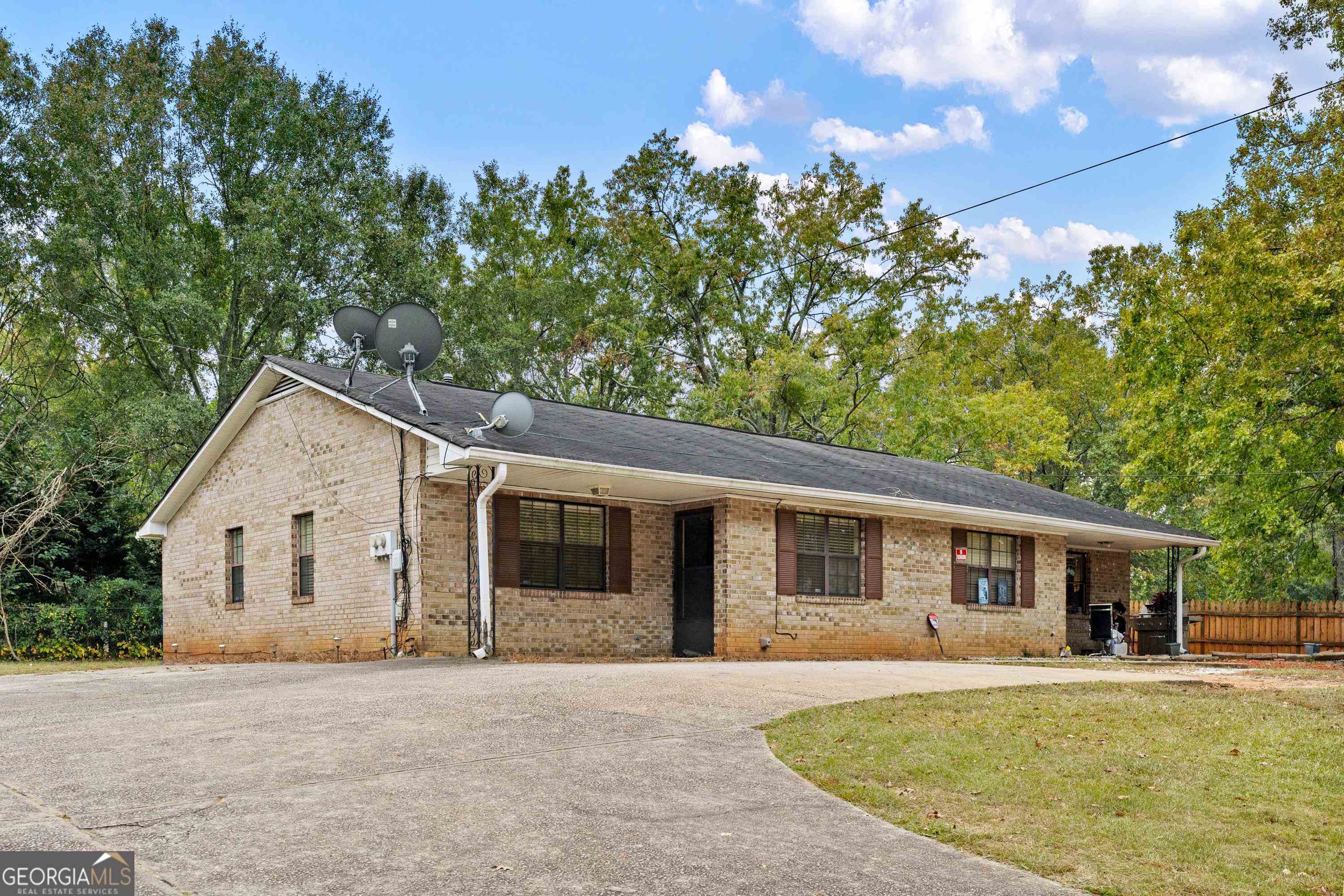 Here is your chance to own not two but FOUR UNITS on one driveway in the heart of Conyers. Introducing this value play duplex with minimal work needed to get rent ready and cash flowing! Each unit features 2 spacious bedrooms and 1 bath. Your kitchen area offers an opening into a spacious living room offering plenty of entertaining space. Priced to sell as an individual duplex or buy both duplexes this is one you do NOT want to pass up on!