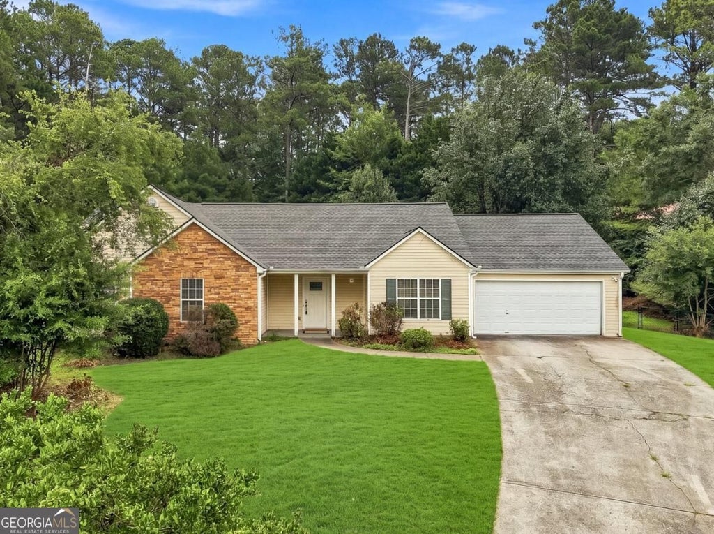 Photo of 1105 Poplar Lane, Loganville, GA 30052 (MLS # 10846536)