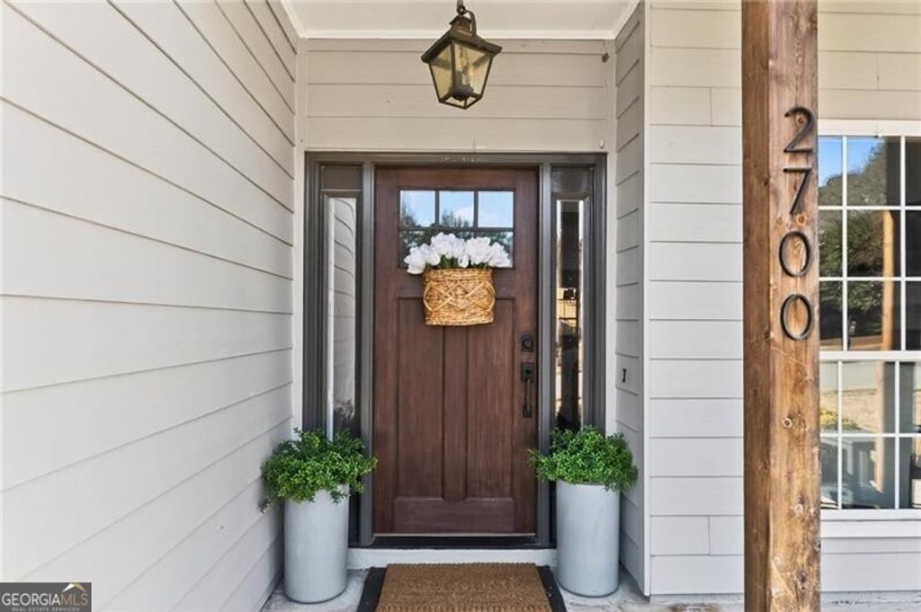 Photo of 2700 Laurelwood Lane, Alpharetta, GA 30009 (MLS # 10709249)