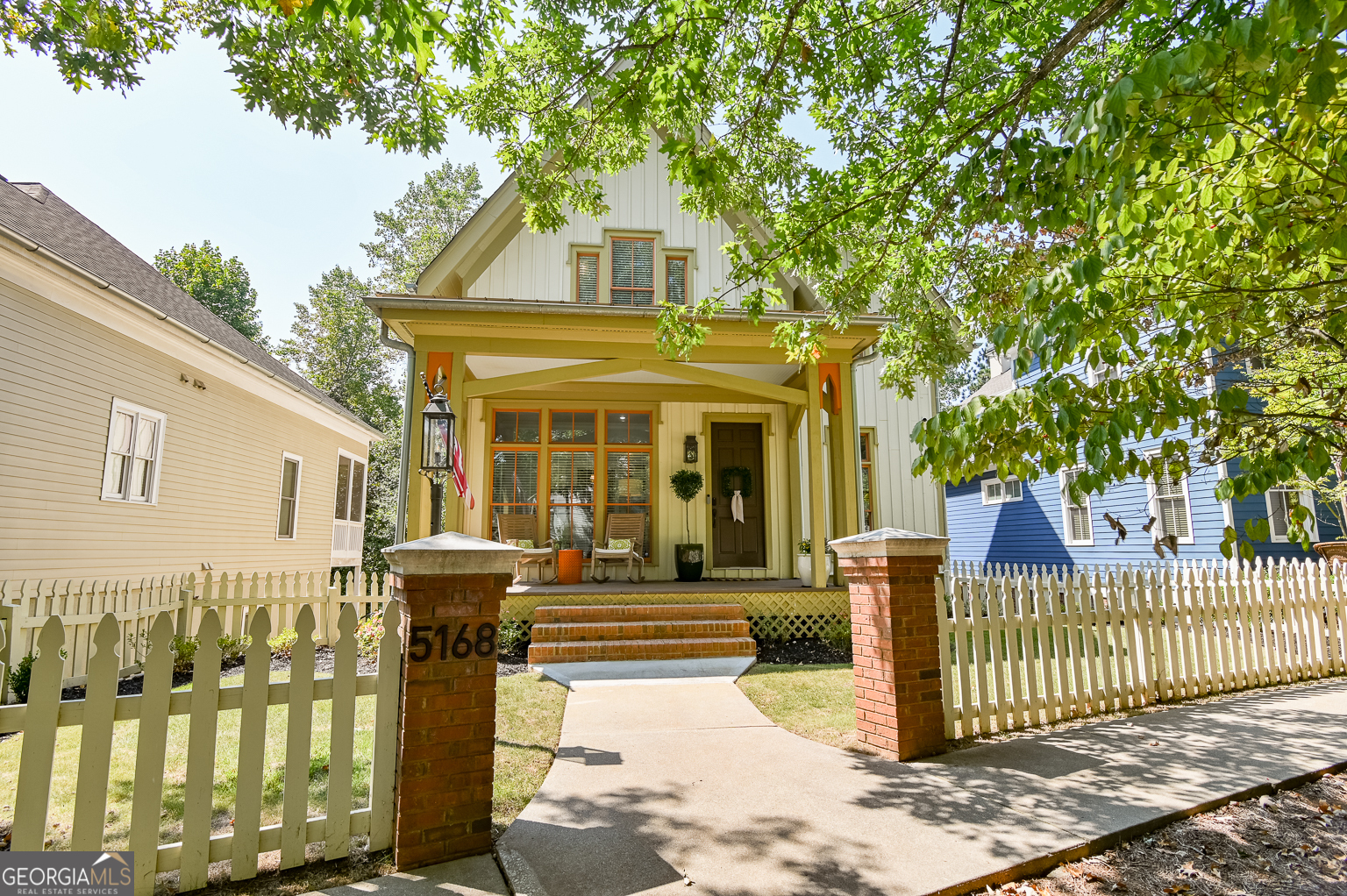 Sunny, light-filled home in Covington's coveted Clark's Grove in-town neighborhood. This picturesque home backs up to the Cricket Frog trail, which connects you to Covington, Mansfield, and Newborn. This offers plenty of privacy, while allowing you to bike with your family or walk with your furry friends to neighboring communities along this paved trail. Tree lined, well lit sidewalks lead you to a picket fence around the front yard. From there you can step into an airy, open main floor with hardwood floors, 10' ceilings, and the perfect set up for entertaining. A finished basement with a full bath provides the opportunity for the perfect man-cave or theater room. Neighborhood amenities boast a community pool, park, baseball field, community garden, walking trails throughout, and even a Montessori school. Being under a mile from the historic downtown Covington, you can drive your golf cart into town if you don't want to walk. Enjoy activities such as movie night on the square and concerts at nearby Legion Field, or take your pick from any of the many dining options the square has to offer. Whether you want to stay home and enjoy private serenity from the covered back porch, or head out in the town for activities and dining, this home has everything you could want.