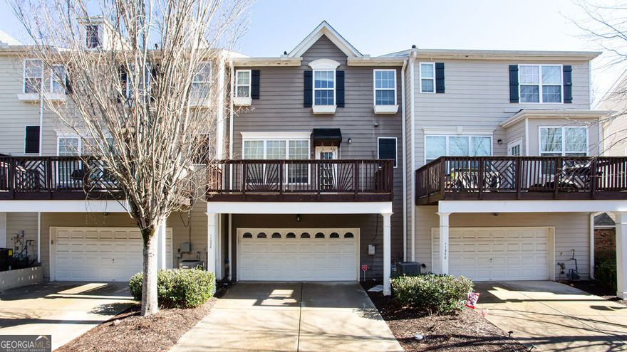 Charming townhome located in the heart of Alpharetta! Brand new updates include carpet, interior paint, and like-new AC unit. In addition to parking, the lower level contains a bedroom and a full bathroom, offering a great setup for a guest suite or home office. Upon entering the main floor, you'll be greeted by a gorgeous eat-in kitchen with island, bar seating, stainless steel appliances, and walkout access to the sprawling deck. The spacious family room comes with gas log fireplace and lots of natural light--fabulous for entertaining. Upstairs, the generous owner's suite includes a soaking tub, separate shower, double vanity, and a walk-in closet. The large secondary bedrooms provide ample closet space. Westside Villas is a wonderful friendly community offering a pool, playground, and clubhouse! Just minutes from Avalon and downtown Alpharetta, you'll have easy access to shopping, dining, and entertainment. Don't miss out-schedule a tour today!