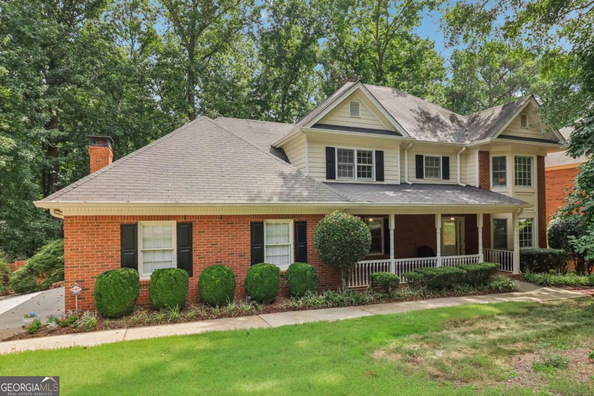 Welcome to 718 Haralson Drive - a true gem in the heart of beloved Haralson Hills. This spacious 4-bedroom, 4-bathroom home with a full finished basement sits on just over an acre in one of Lilburn's most picturesque and established neighborhoods. Haralson Hills is known for its gently rolling landscape, traditional architecture, and well-maintained lots filled with Georgia's signature landscaping. It's the kind of place where neighbors wave from golf carts, families take evening walks with the dog, and there's a strong sense of connection and pride throughout the community. Inside, you'll find hardwood floors throughout the main level, along with a layout that works well for everyday life. The main floor features an entry foyer, formal living room, fireside family room, formal dining room, a bedroom and full bath, a laundry area, and an eat-in kitchen that's been recently renovated. You won't have to dream about getting quality cabinets or solid surfaces-you'll already have them. The kitchen includes all-new white cabinetry, stone countertops, and stainless steel appliances, offering the function and look you've been wanting. From the fireside living room, you can step straight out to the large back deck, which overlooks the private backyard and koi pond-a great space for a morning coffee or an easy Friday night at home. Upstairs are two spacious secondary bedrooms with large closets, a full hall bath, and an oversized primary suite with a walk-in closet and private ensuite bath. The primary bathroom features slate tile flooring, a double vanity, a soaking tub, and a separate walk-in shower. One of the bedrooms even includes a built-in Murphy bed, making it ideal for a guest room, office, or multipurpose space. The walkout basement gives you even more room to spread out. It includes two finished flex rooms, a full bathroom, one large storage room, and an unfinished workshop area-whether you need a home gym, craft space, or a place for tools and weekend projects, you've got options here. Outside, the 1+ acre lot offers privacy, mature landscaping, and room to enjoy all four seasons. With no mandatory HOA, you have flexibility, but the neighborhood still maintains a well-kept look thanks to a volunteer community association that takes pride in the area. Location-wise, it's hard to beat. You're walking distance to Parkview High and Camp Creek Elementary, with quick access to Highway 78, Decatur, Emory, CDC, Tucker, and downtown Lilburn. Local parks like JB Williams Park and Mountain Park Park are just minutes away and offer everything from playgrounds and ball fields to walking trails, skate parks, and dog parks. Plus, you're just down the road from two of Lilburn's favorite upscale-casual restaurants-1910 Public House and Fresca Trattoria. This is more than a house-it's a solid home in a community where people put down roots.