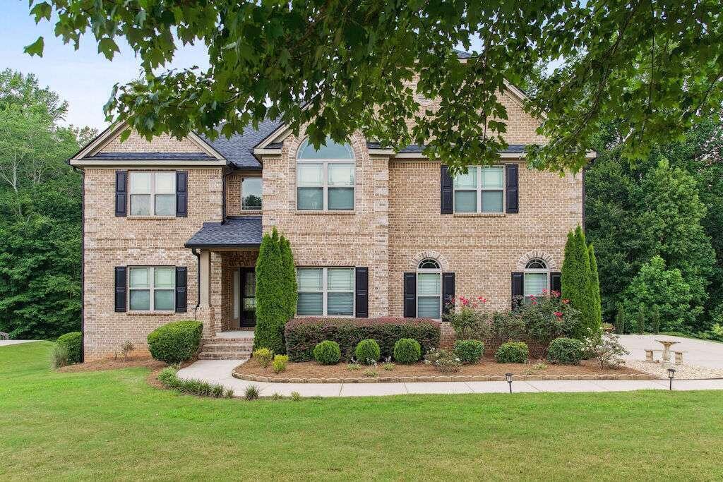 Your search stops here, and your new home awaits! This immaculately kept one-owner home has tons of indoor and outdoor space, an entertainer's dream. The main level features a grand foyer, formal living, separate dining area with a coffered ceiling, which leads to a large family room with an open floor plan. The gourmet kitchen has views of two living spaces on the sides, a large breakfast bar, granite countertops, and an eat-in area. Right off the kitchen is a beautiful deck with views of a spacious backyard. Upstairs there are 4 bedrooms, a laundry room, a grand owner's suite with a spacious sitting area, and another large living space to be used as desired. The lower level has a fully finished basement, 1 bedroom/bath, two bonus rooms, a bar area, and a media room. This home is a must-see. Schedule a private showing today!