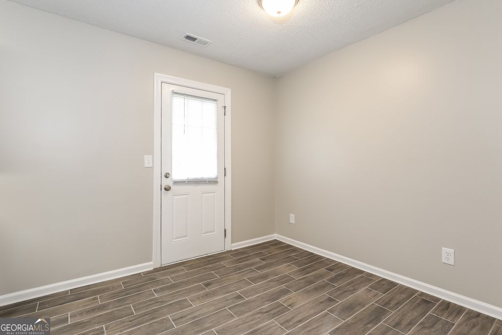Photo of 8808 Edenton Way, Jonesboro, GA 30238 (MLS # 10629638)