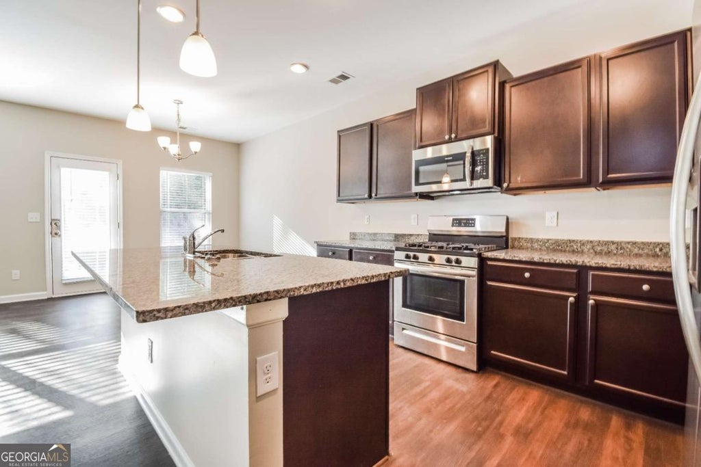 Photo of 4995 Rapahoe Trail, Atlanta, GA 30349 (MLS # 10809359)