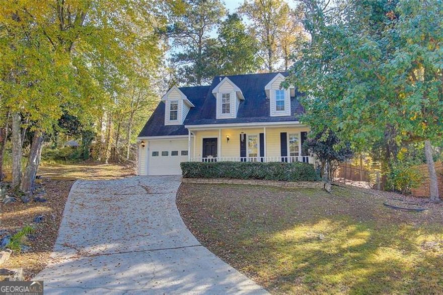 Welcome to 5921 Brookside Dr SE - a charming 3-bedroom, 2-bath home located in the quiet Johnston's Crossing community of Mableton! This beautifully maintained property offers over 1700 square feet of living space with a bright, open floor plan and plenty of natural light throughout. The spacious family room features a cozy fireplace and flows seamlessly into the dining area - perfect for entertaining or family gatherings.  The kitchen offers ample cabinet space, quartz countertops, and access to the private backyard, ideal for summer barbecues or relaxing evenings outdoors. The primary suite includes an ensuite bath, newly remodeled walk-in shower and generous closet space, while two additional bedrooms provide flexibility for guests, an office, or a home gym.  Enjoy the large lot with mature trees and room for gardening or outdoor fun. Conveniently located near major highways, shopping, and schools, this home offers easy access to all that Cobb County has to offer while maintaining a peaceful suburban feel.  Don't miss your chance to make this Mableton gem your new home - schedule your showing today!