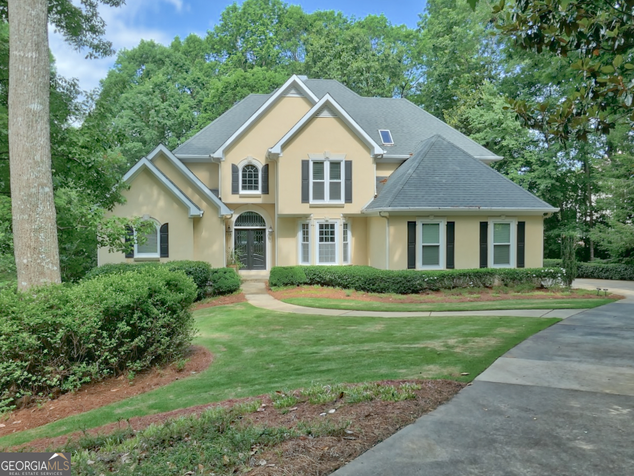 Exquisite home located on the 3rd hole of the Creek Course @ Eagle's Landing Country Club. Eagle's Landing is a private gated country club community located 5 minutes from shopping, medical facilities, I-75, 20 minutes from Hartsfield-Jackson International Airport and 35 minutes from downtown Atlanta. This beautiful home has been lovingly taken care of and is in great condition. The grand foyer opens into an oversized formal dining room with a bay window. A 2 story great room with built in bookcases and a see thru fireplace is filled with natural light. A keeping room with see thru fireplace into the great room opens into the kitchen and breakfast area. The custom kitchen has CANAC custom cabinetry and an island. The tranquil setting of the breakfast area has beautiful views overlooking the golf course. The spacious primary bedroom boasts a double tray ceiling and a large sitting area. The spa type bathroom has dual vanities, an oversized shower, jetted tub and 2 closets. The 2nd level has 3 bedrooms which are serviced by 2 full bathrooms. The bedrooms have great closet space. The terrace level is finished with extra living space for everyday life, entertaining or multi-generational living with a large family room area with fireplace. Fireplace is flanked with built in cabinets which are a hidden gem. A wet bar is open to a dining/game area. A large bedroom and full bathroom can also be found in the finished area. Interior features include REAL red oak hardwood flooring, beautiful trim, large laundry with sink, built in bookcases, built in desk and much more. Membership to Eagle's Landing Country Club is available.