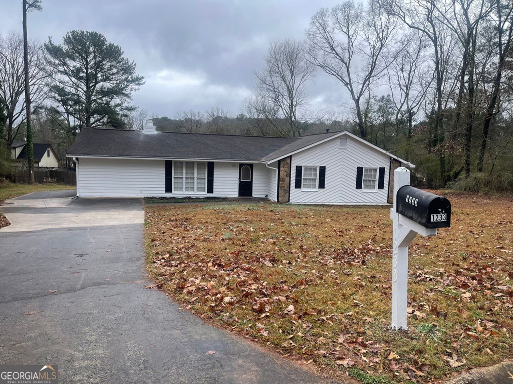 Photo of 1233 Woodland Court SE, Conyers, GA 30013 (MLS # 10664914)
