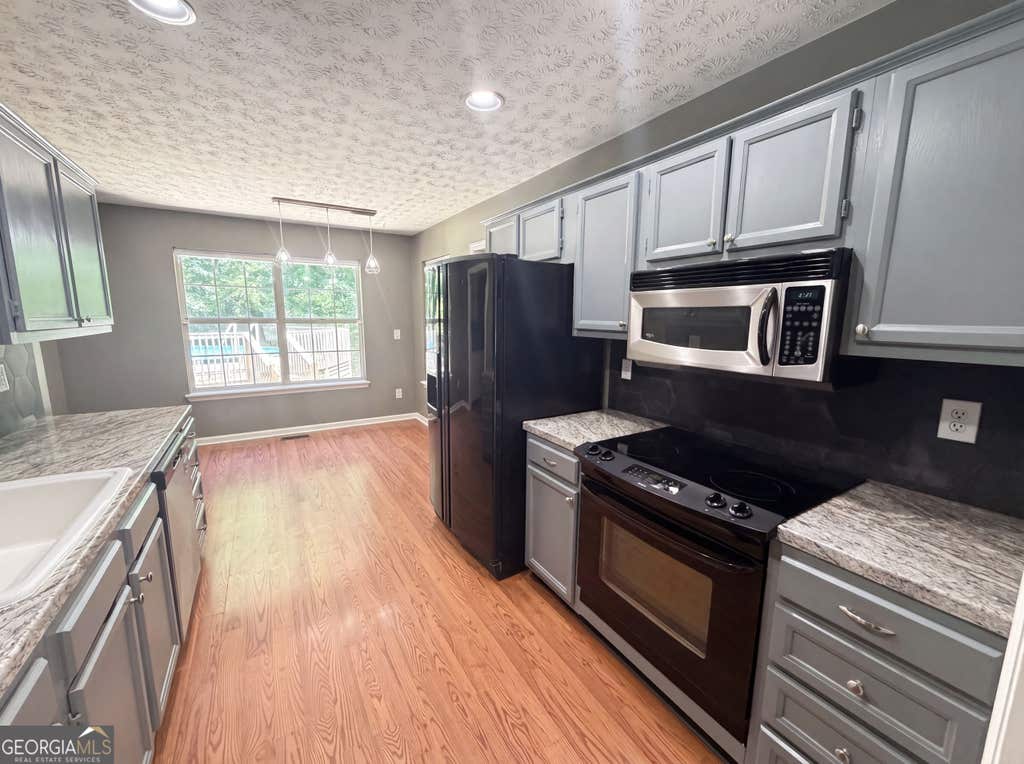 Photo of 4150 Jonathan Lane, Cumming, GA 30040 (MLS # 10793576)
