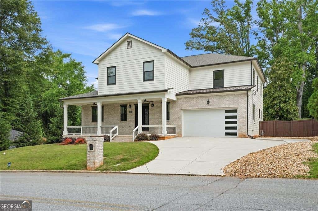 Photo of 2415 Rugby Avenue, Atlanta, GA 30337 (MLS # 10818801)