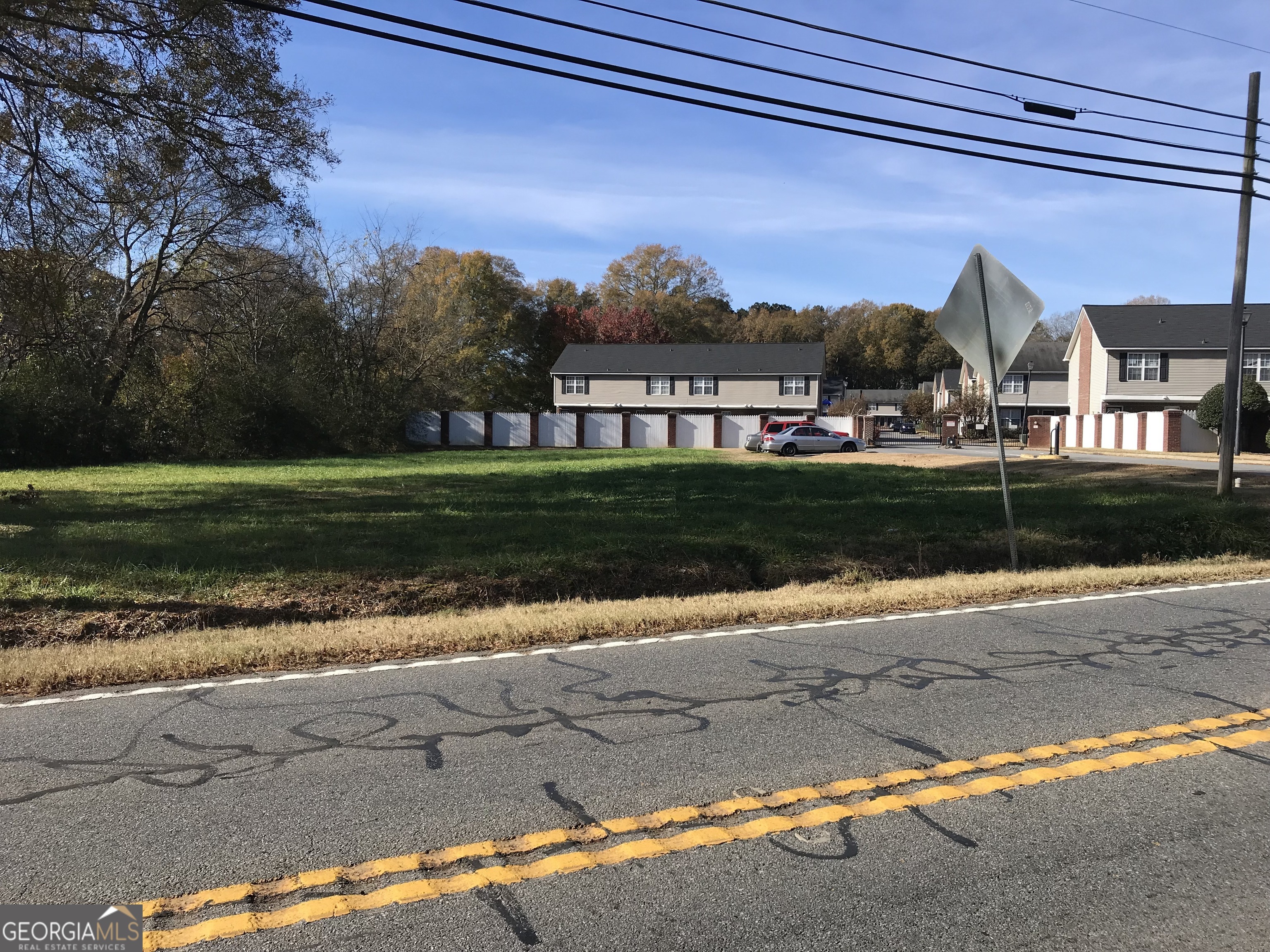 Commercial lot located on Cassville Road just north of Cartersville. Approved development plans for 3,200 s/f building. Driveway entrance approved. Water tap and sewer tap in place. Retention pond in place. Level topography. Ready to build.