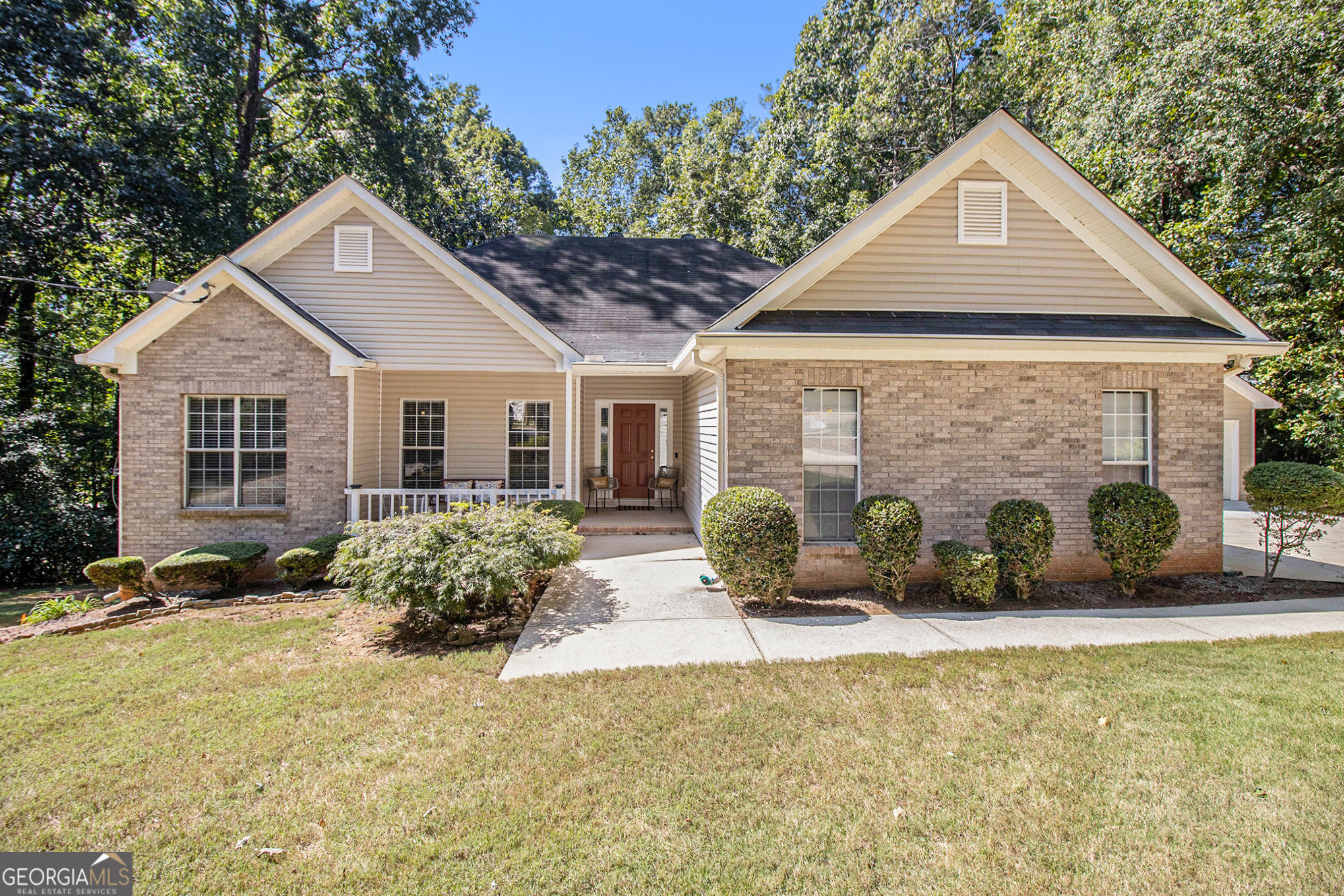 Welcome to this beautifully maintained ranch home nestled on a quiet, private, wooded cul-de-sac lot. From the moment you arrive, the inviting rocking chair front porch and timeless curb appeal will captivate you! As you pull up, you'll notice the detached 2-car garage plus an additional outbuilding-perfect for all your toys, RV, boats, motorcycles, or extra vehicles. A true dream for hobbyists and collectors! Step inside to discover gorgeous LVP flooring throughout, an open-concept floor plan, and a spacious family room with soaring cathedral ceilings. The chef's eat-in kitchen boasts custom cherry cabinetry, granite counters, stainless steel appliances, and ample storage. With a seamless view to the family room and dining area, entertaining guests is effortless and enjoyable. Enjoy peaceful mornings on your back deck overlooking the private, wooded backyard, complete with an additional storage building-ideal for both relaxation and functionality. The oversized master suite offers a sitting area, cathedral ceiling, updated spa-like bath with a custom tile shower & bench, soaking tub, new vanity, and a generous walk-in closet. Two additional bedrooms and a full bath complete the main level, ensuring space and comfort for everyone. Downstairs, the full finished basement is an entertainer's paradise! Featuring a large recreation/living area, a fourth bedroom, full bath, second full kitchen, and flex space-this level is perfect for an in-law suite, man cave, or the ultimate hosting retreat! This home truly has it all and must be SEEN to be fully appreciated! Don't miss your chance to own this one-of-a-kind property. Make this DREAM home your REALITY today and schedule your showing!