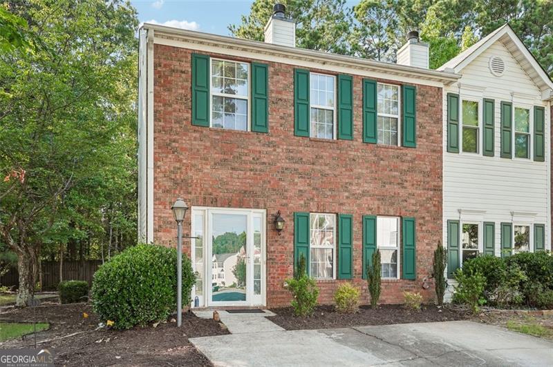 Welcome to this beautifully updated end-unit townhome, nestled in a quiet cul-de-sac just 5 minutes from I-75! Enjoy fresh interior paint, new flooring, updated bathroom countertops, and stylish tile details throughout, making this home both modern and move-in ready. The open-concept main floor features a large kitchen with ample cabinet and countertop space, durable tile flooring for easy cleaning, and a half bath perfect for guests. Step out onto your private, well-maintained deck, ideal for outdoor entertaining or relaxing after a long day. As an end unit, you'll love the generous yard space and bonus shed for extra storage. Upstairs, the roommate-style layout offers two spacious bedrooms, each with its own en-suite bathroom, providing flexibility and privacy for any living arrangement. For your peace of mind, this home also includes a 1-year home warranty. Plus, when you work with our preferred lender, you'll receive 1% of the purchase price toward your closing costs-a great way to save from day one! Don't miss this incredible opportunity-updated, well-located, and full of perks. Schedule your private showing today!